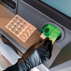 Fraudster using a card at an ATM