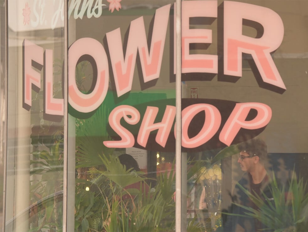 Customer shopping inside a St. Johns flower shop
